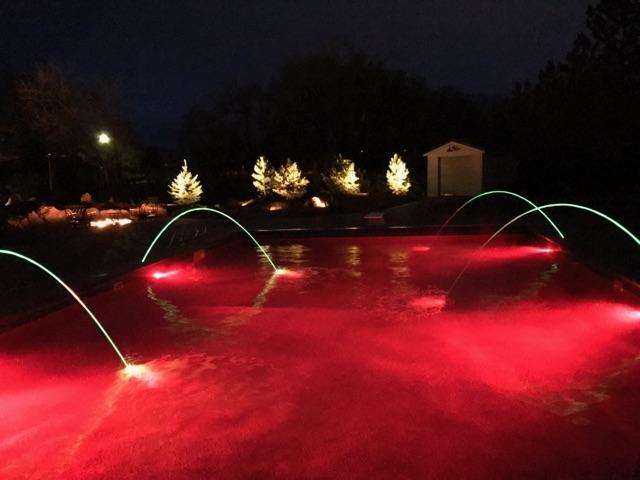 red pool lights, water feature